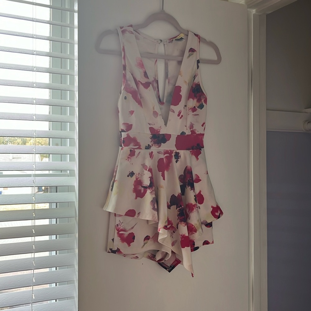 Legs n chest night out romper with the illusion of a skirt